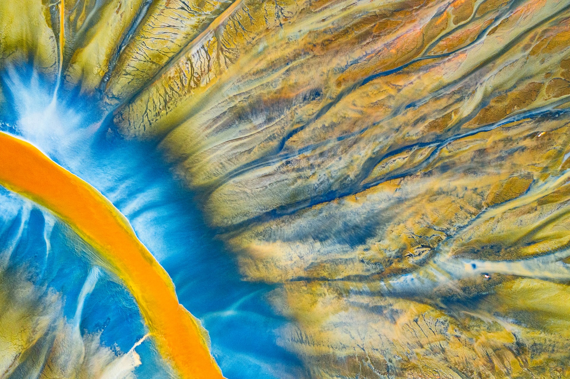 Poisoned River | Abstract WinnerA detailed photograph of a stream filled with poison. ‘Poisoned Beauty’ is a personal project that tells the story of the natural disaster in the Apuseni Mountains in Transylvania, which was a result of chemical waste generated by copper and gold mining, but in a beautifully abstract wayPhotograph: Gheorghe Popa/Drone Photography Awards 2021