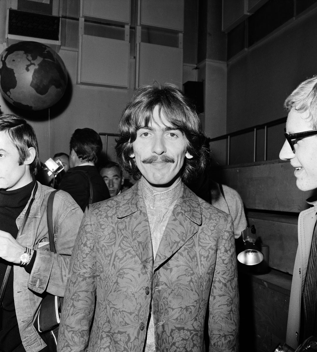 Джордж Харрисон в студии Abbey Road, 25 июня 1967 года Broadcast to 26 countries and watched by 400 million, the programme was broadcast via satellite on June 25, 1967. The BBC had commissioned the Beatles to write a song for the UK's contribution. 'All You Need Is Love' a song written by John Lennon and credited to Lennon/McCartney was first performed by The Beatles at this event & released as a single the following month. Pictured at Abbey Road Studios 24th June 1967. (Photo by Sunday People/Mirrorpix/Mirrorpix via Getty Images)